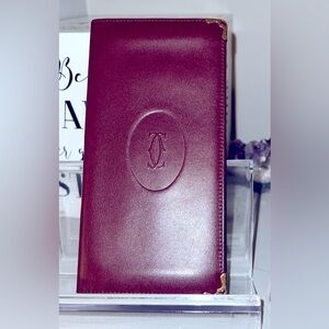 Like new Cartier bifold wallet with card! Unisex
